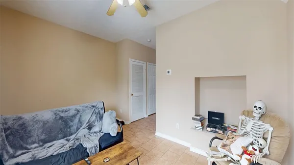 a living room with furniture and a couch