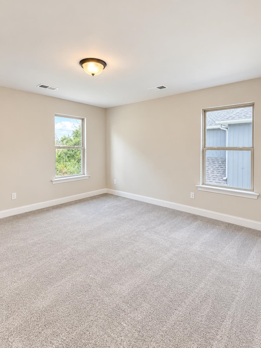 5545 Shipp Road Millington, TN 38053 - Photo 12 of 12 Neutral-toned walls complement the light-colored carpet flooring