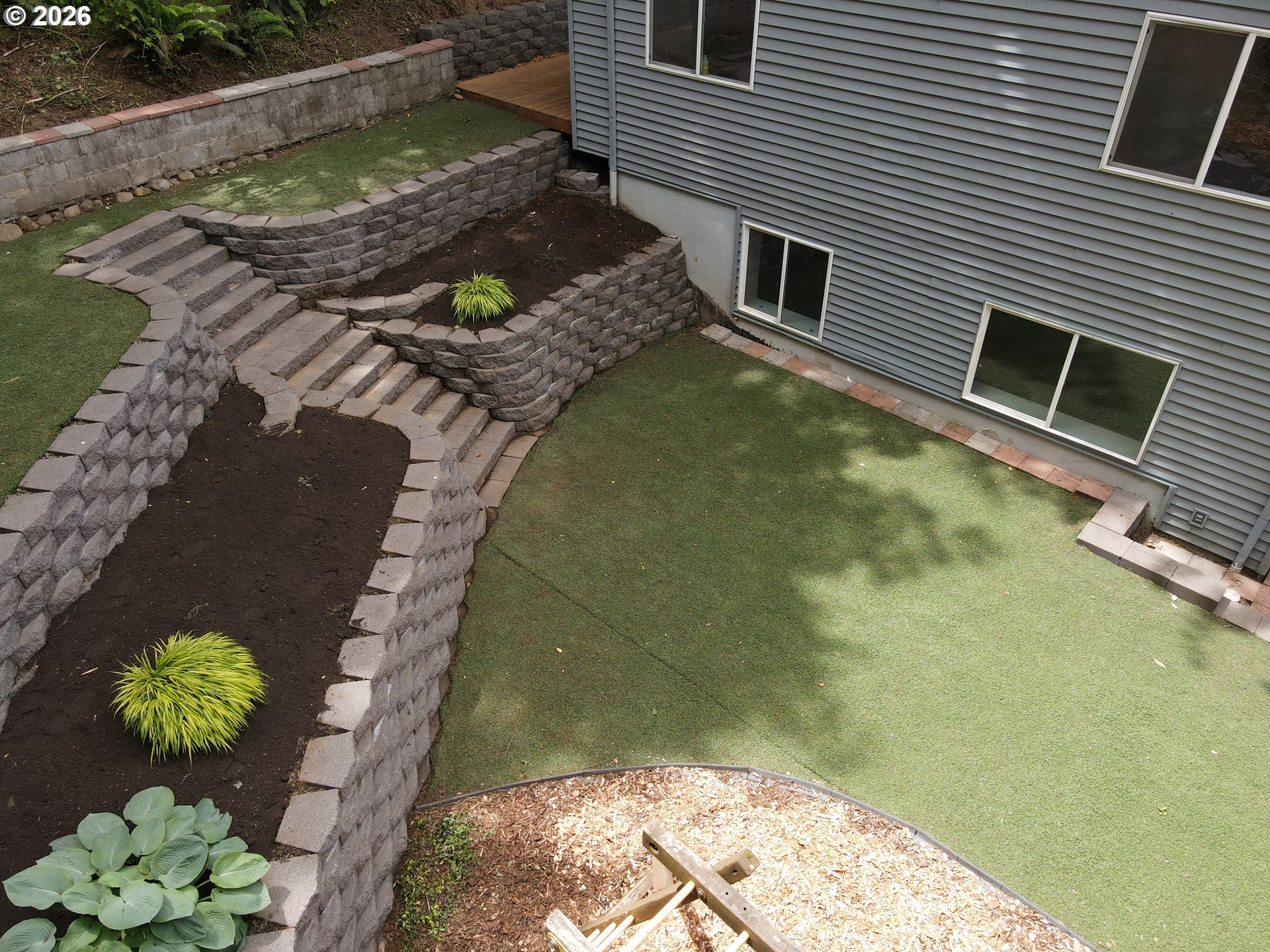 4024 Southeast 154th Place Portland, OR 97236 - Photo 32 of 43 a view of a backyard with chairs