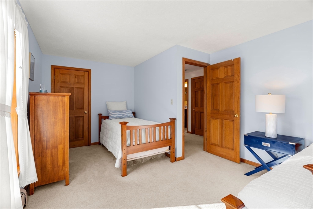 1 Stacey Lane Amesbury, MA 01913 - Photo 24 of 41 a bedroom with a bed and a window