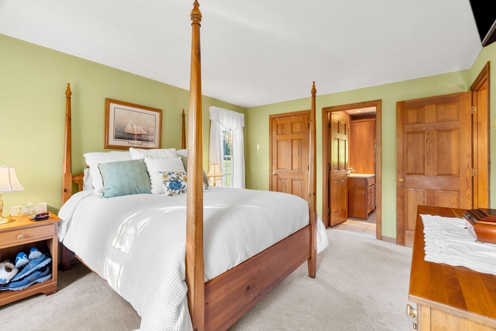 1 Stacey Lane Amesbury, MA 01913 - Photo 29 of 41 a bed room with a bed and a walk in closet