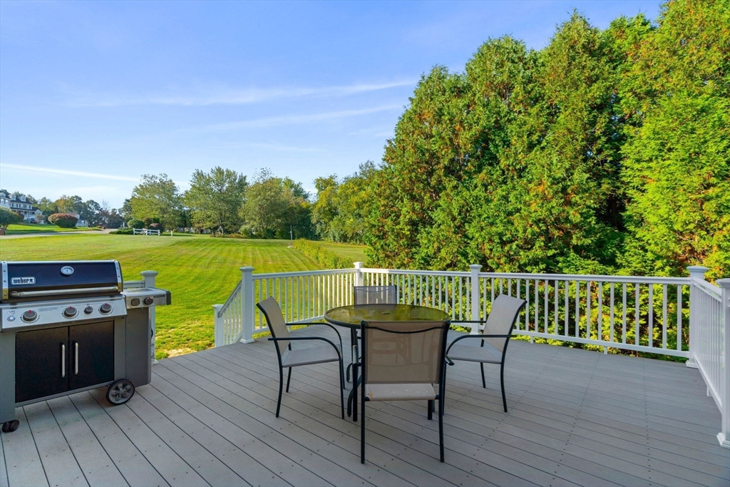 1 Stacey Lane Amesbury, MA 01913 - Photo 32 of 41 a view of a balcony with furniture and wooden floor
