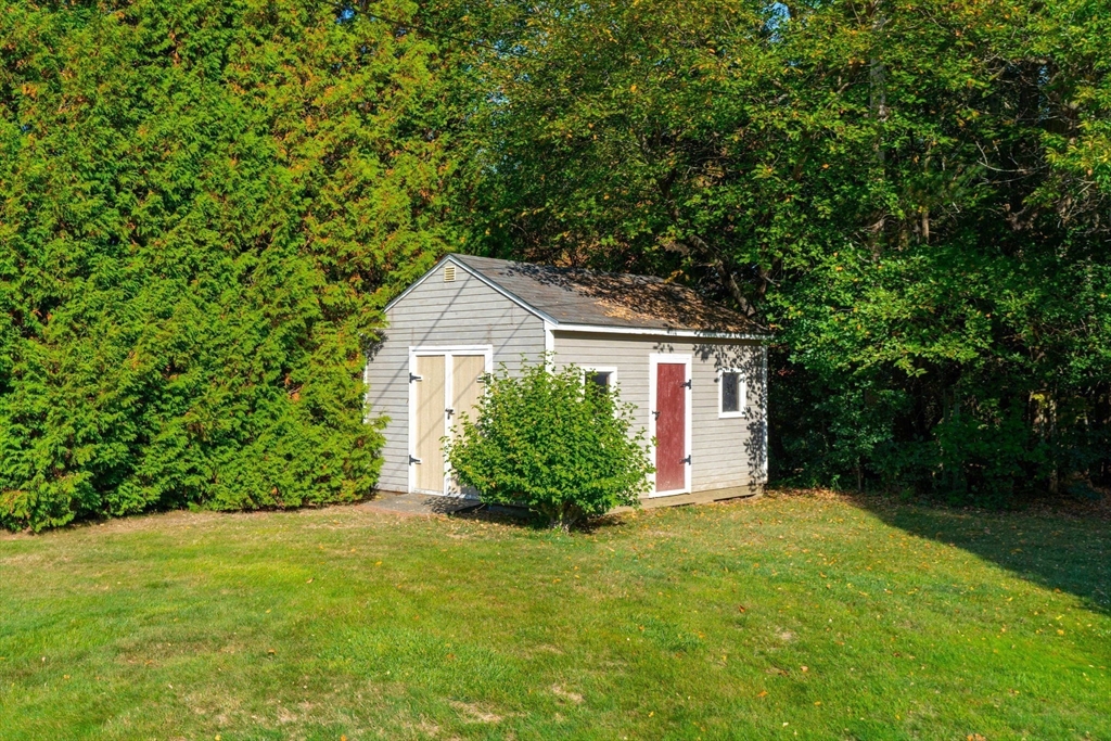 1 Stacey Lane Amesbury, MA 01913 - Photo 37 of 41 a view of a house with backyard and garden