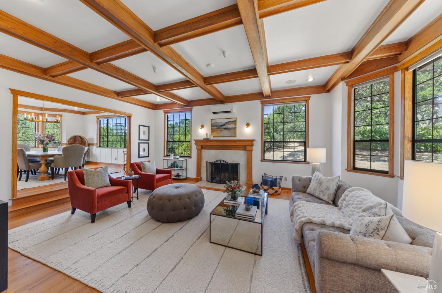 10 Lockton Lane Novato, CA 94945 - Photo 9 of 68 Formal living room with generous proportions, natural light, and views toward the mature oak trees and surrounding greenery.