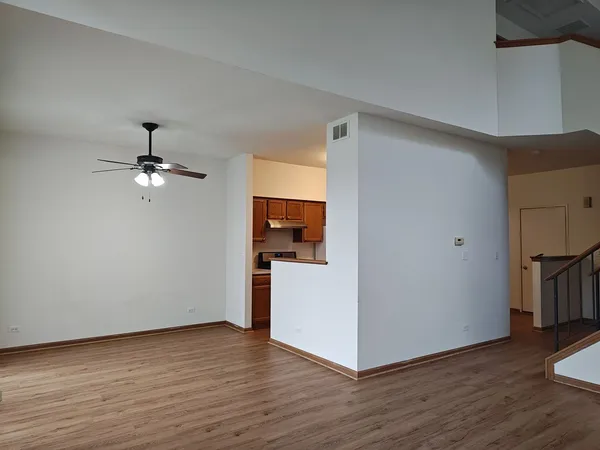a view of a livingroom with wooden floor