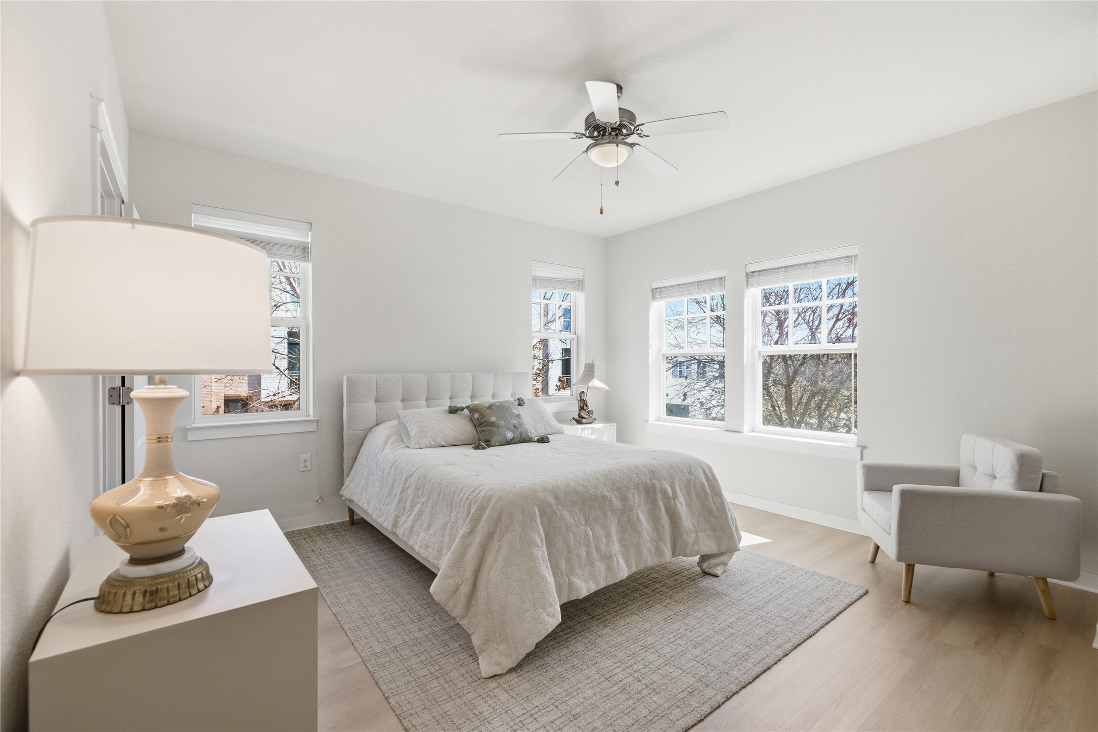3900 Threadgill Street, Unit 2 Austin, TX 78723 - Photo 12 of 19 A ceiling fan and loads of light keep things cool and bright.