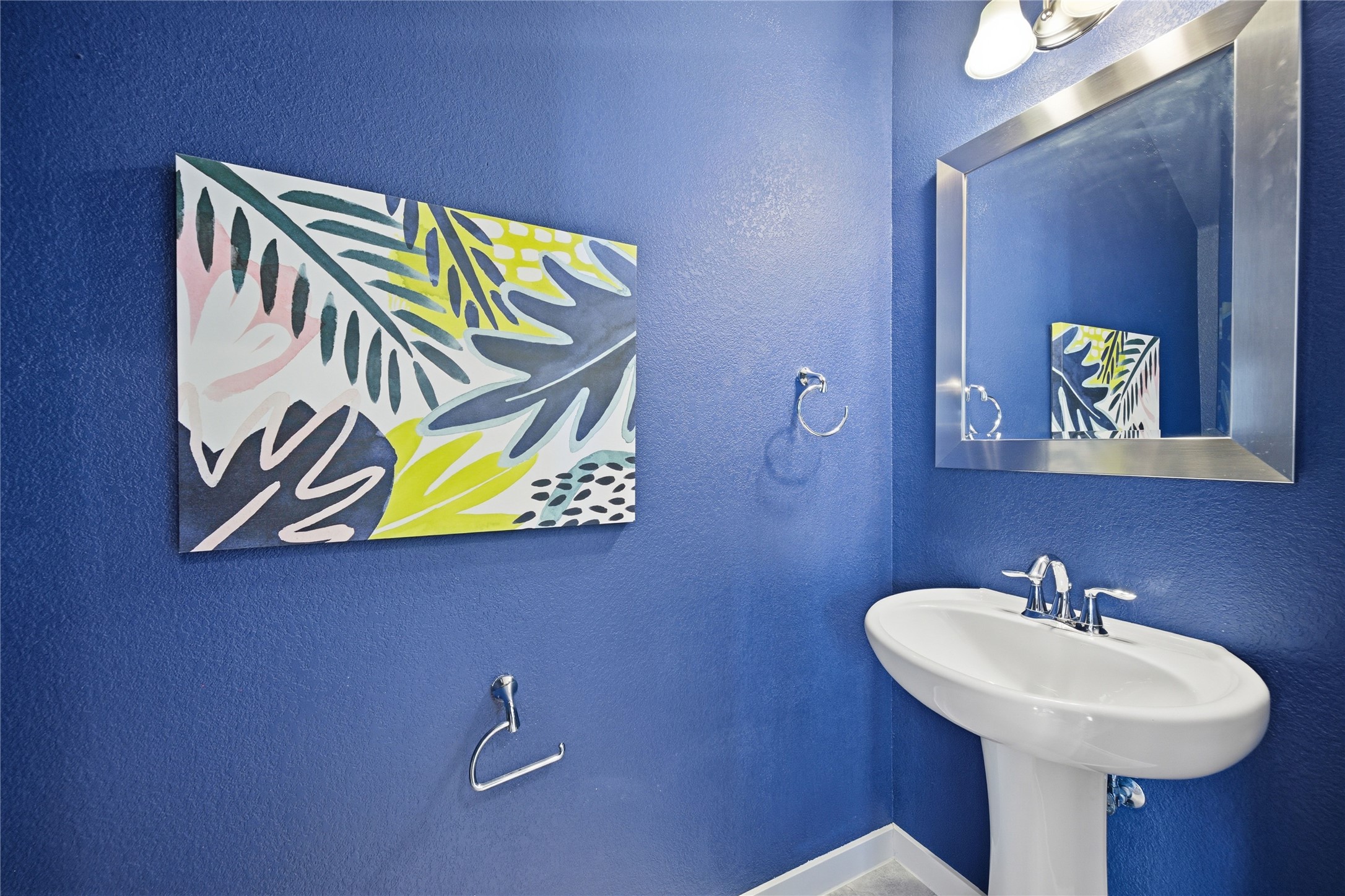 3900 Threadgill Street, Unit 2 Austin, TX 78723 - Photo 9 of 19 The first-floor half bathroom is right off the kitchen.