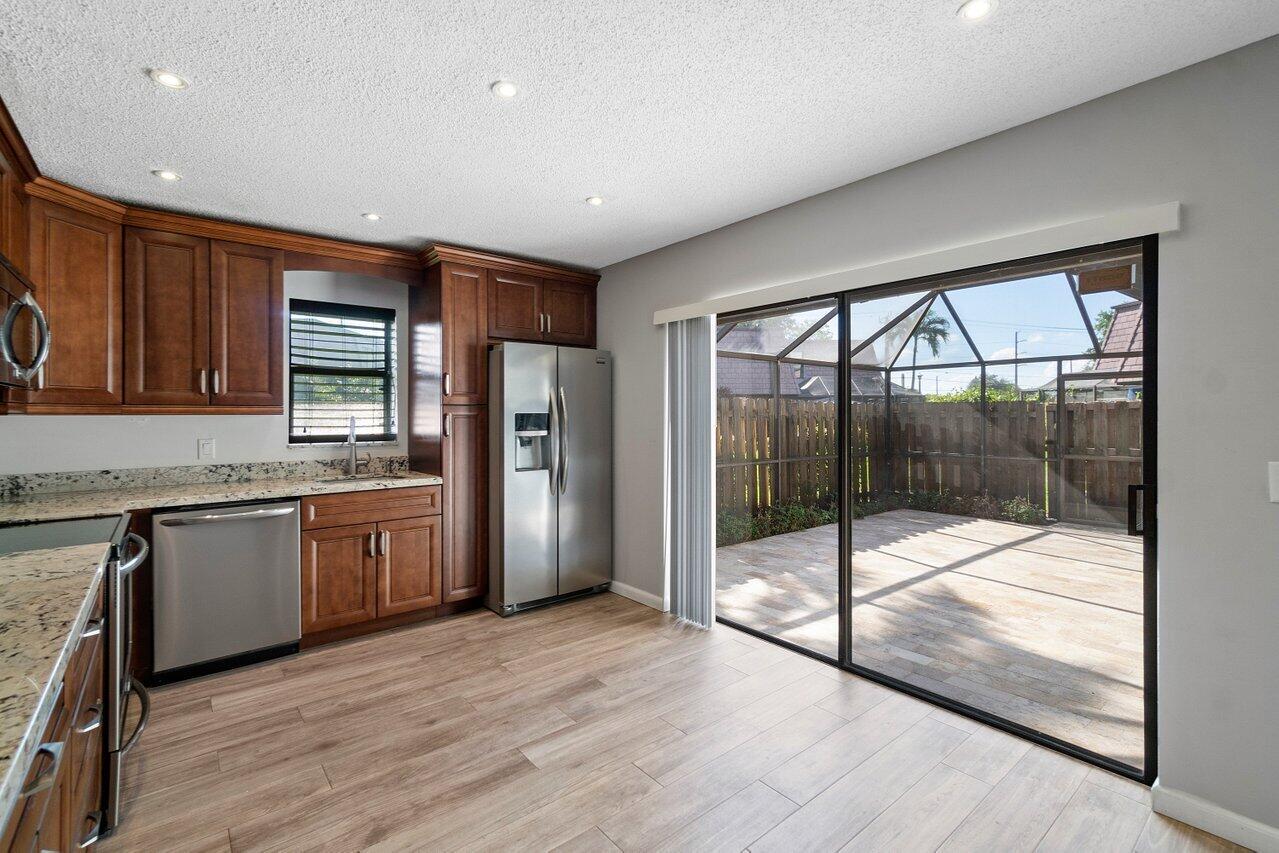 7689 Courtyard Run West Boca Raton, FL 33433 - Photo 8 of 27 Sliding glass doors