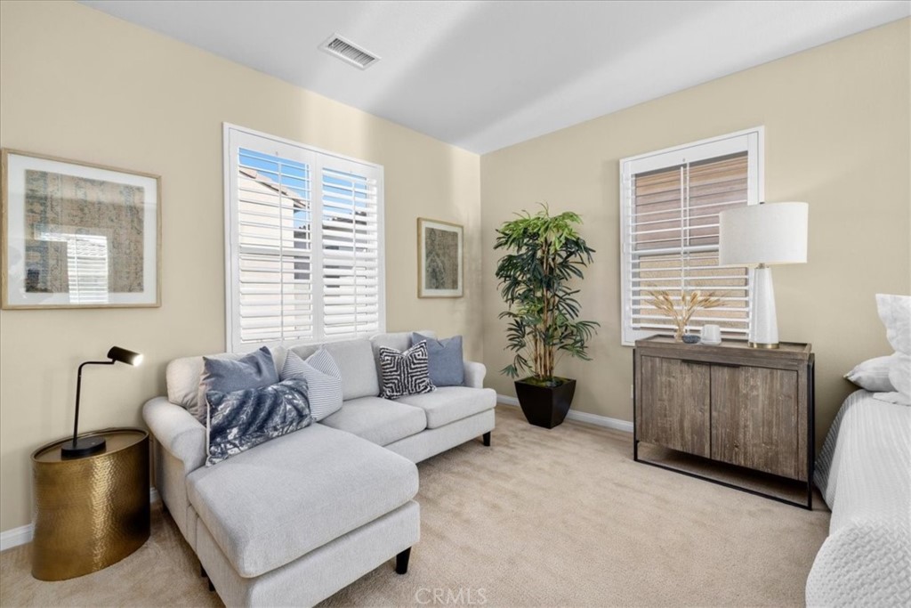197 Firefly Irvine, CA 92618 - Photo 22 of 50 a living room with furniture and potted plant