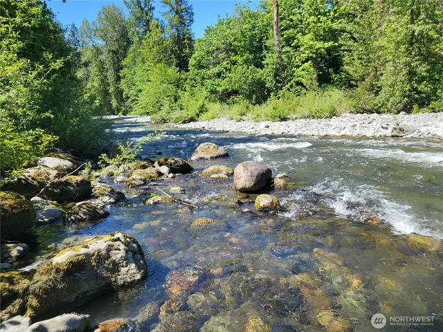 a view of a street with some trees
