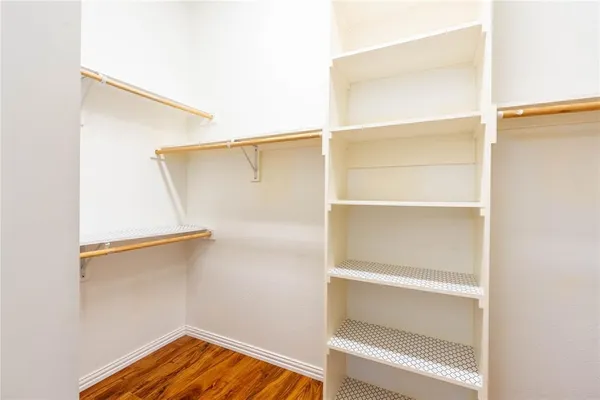 a view of a room with racks on the wall