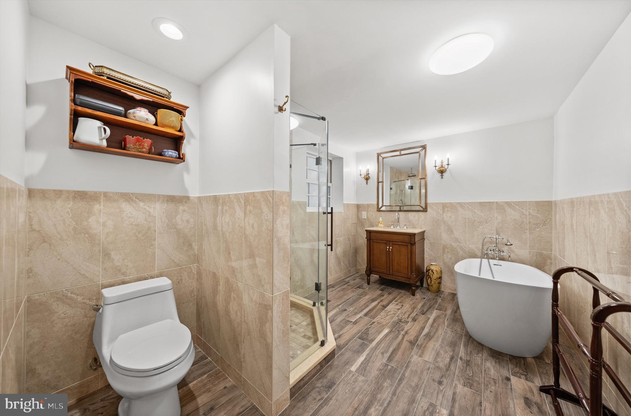 9919 Old Georgetown Road Bethesda, MD 20814 - Photo 19 of 34 Spacious bathroom with separate tub.