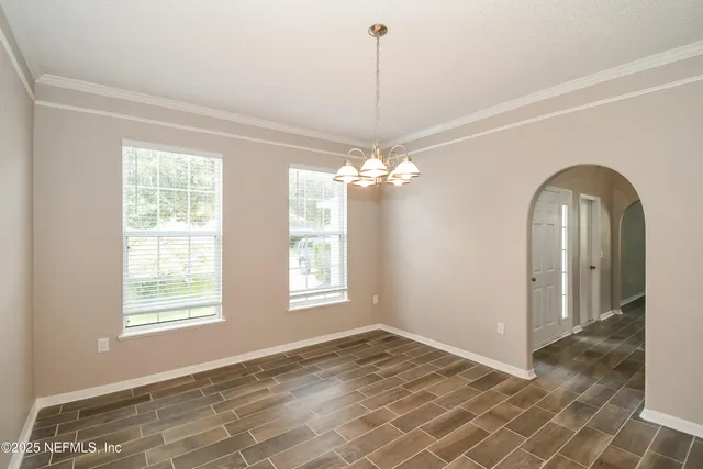 a view of a room with windows