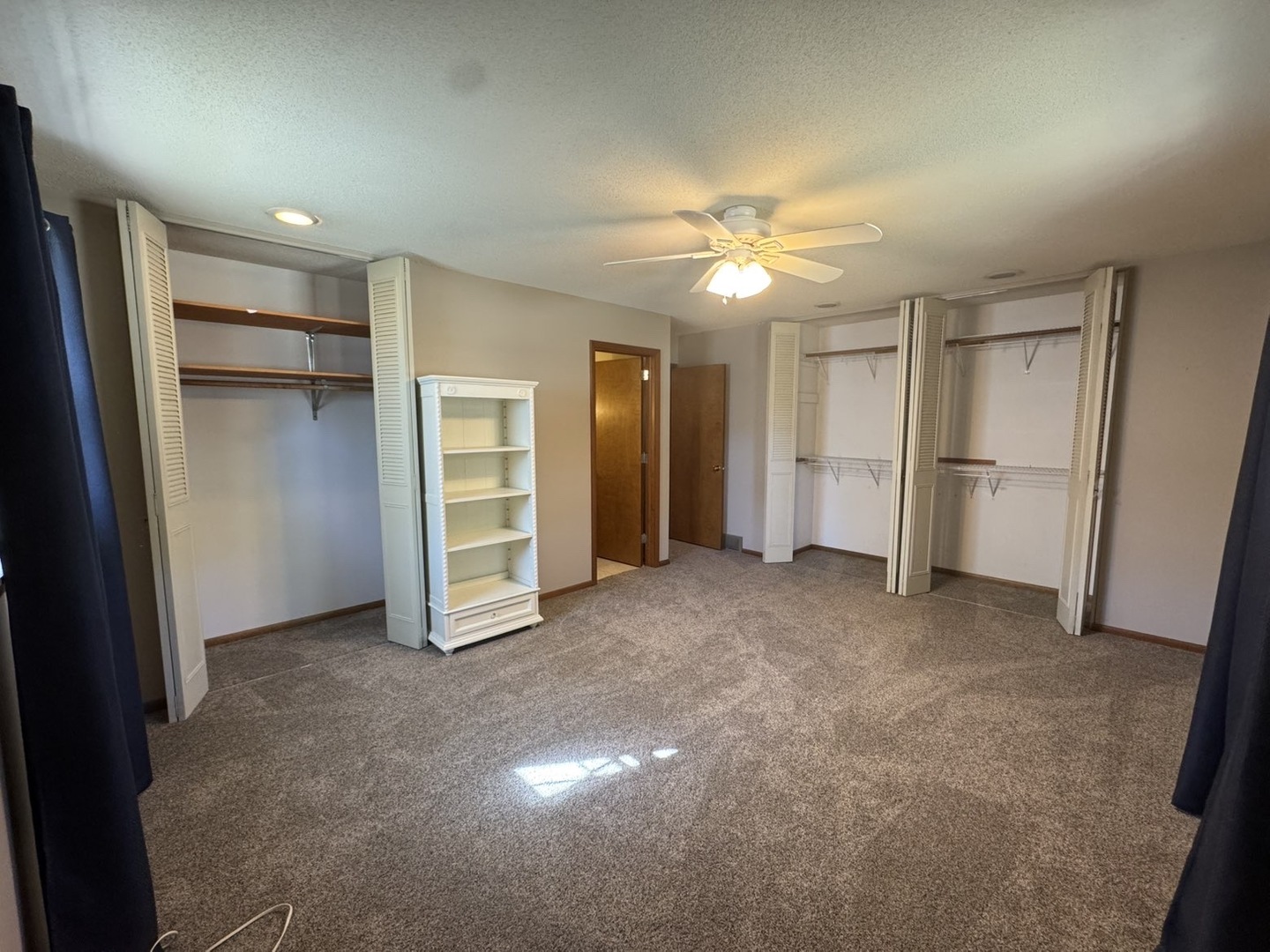 805 Keith Street Morrison, IL 61270 - Photo 24 of 33 a view of empty room with closet and ceiling fan