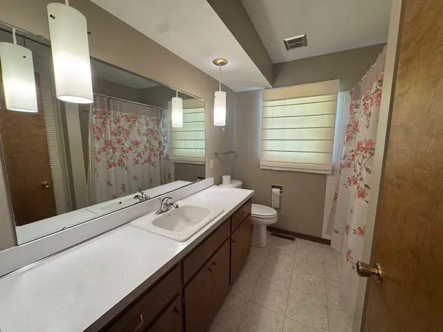 a view of room and a window