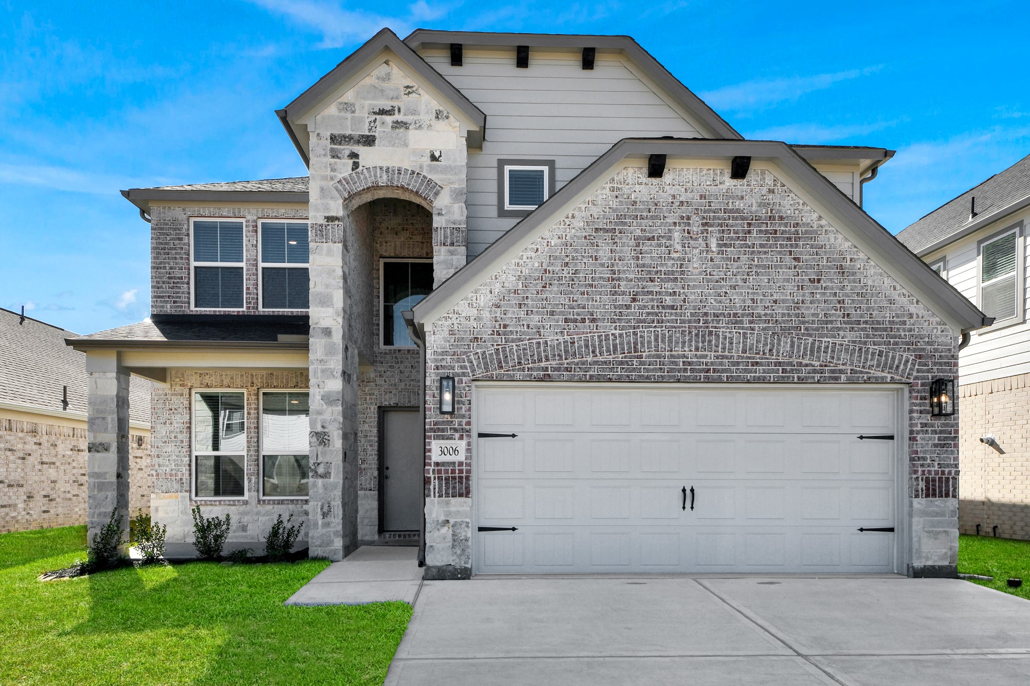 3006 Burris Park Drive Spring, TX 77373 - Photo 3 of 45 a front view of a house with garden
