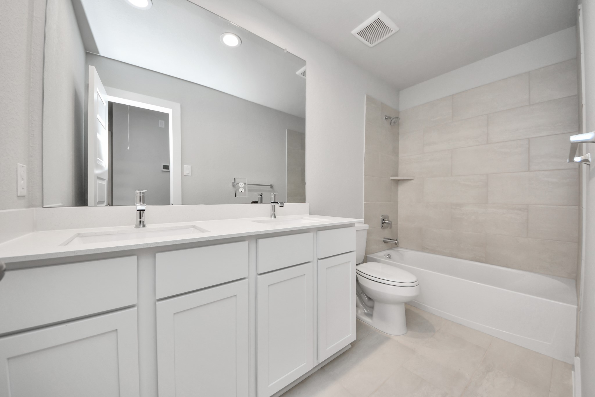 3006 Burris Park Drive Spring, TX 77373 - Photo 37 of 45 a bathroom with a double vanity sink toilet and shower