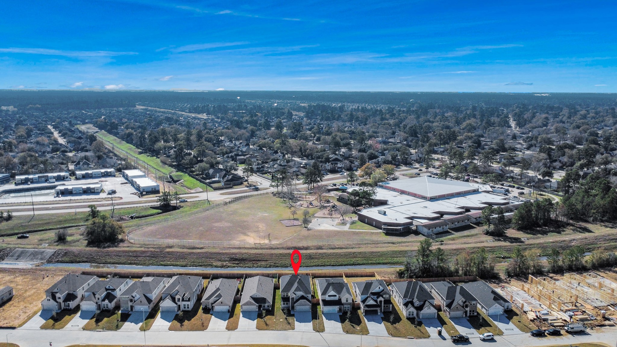 3006 Burris Park Drive Spring, TX 77373 - Photo 4 of 45 An aerial view of a spacious subdivision lot, highlighting a well-maintained yard and a fully fenced perimeter, offering both privacy and expansive outdoor space.