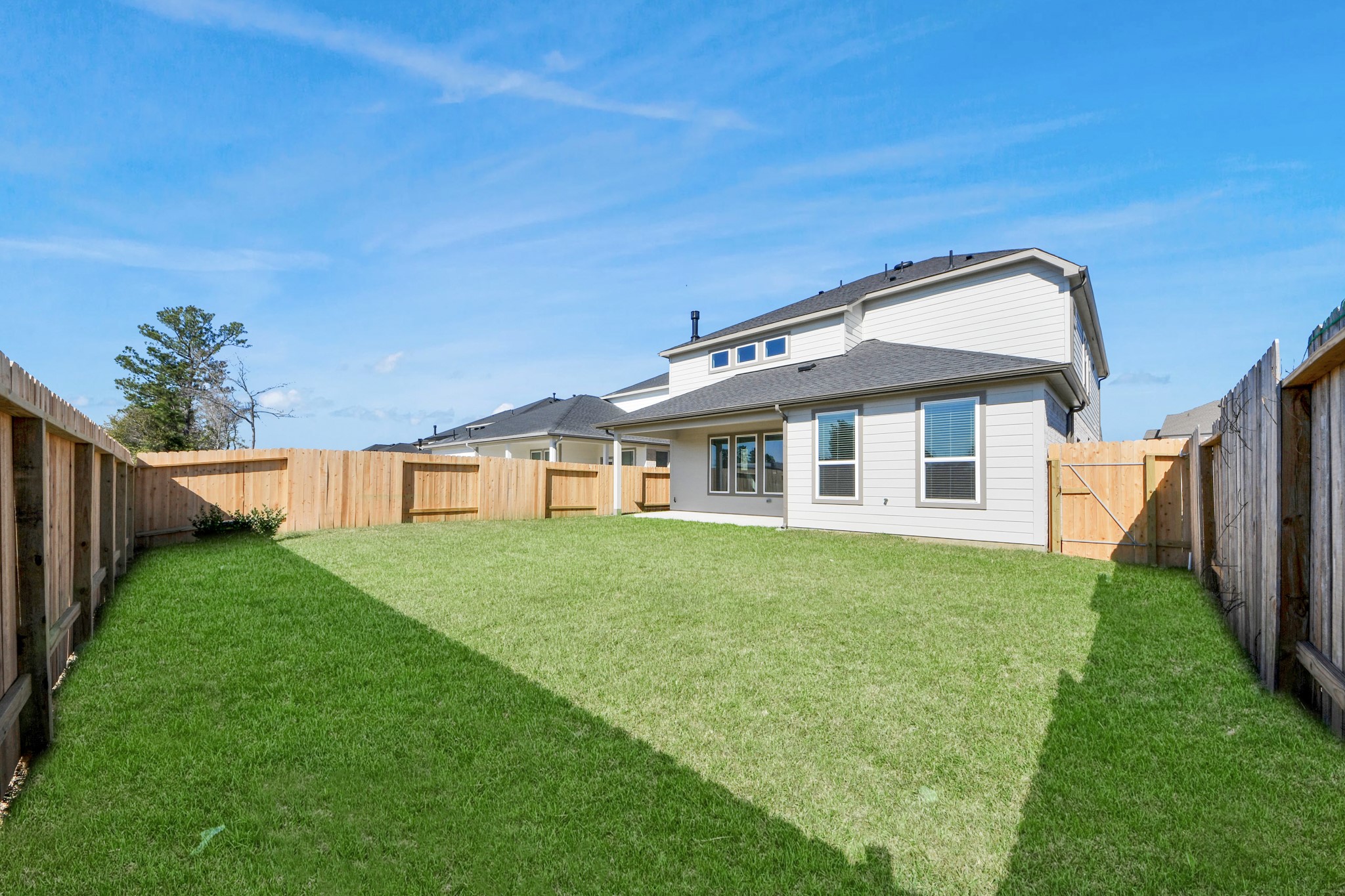 3006 Burris Park Drive Spring, TX 77373 - Photo 42 of 45 a front view of a house with a yard