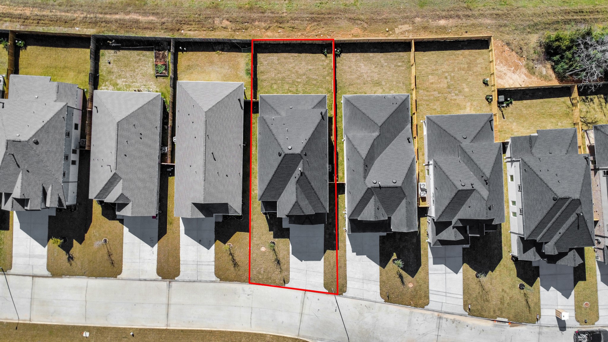 3006 Burris Park Drive Spring, TX 77373 - Photo 5 of 45 An aerial view of a spacious subdivision lot, highlighting a well-maintained yard and a fully fenced perimeter, offering both privacy and expansive outdoor space.