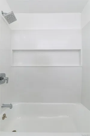 a bathroom with a bathtub