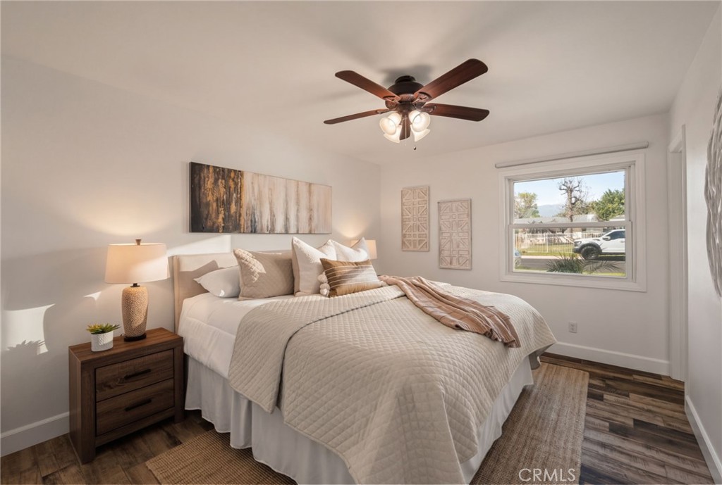 6661 Yucca Avenue Rialto, CA 92376 - Photo 21 of 44 a bedroom with bed and window