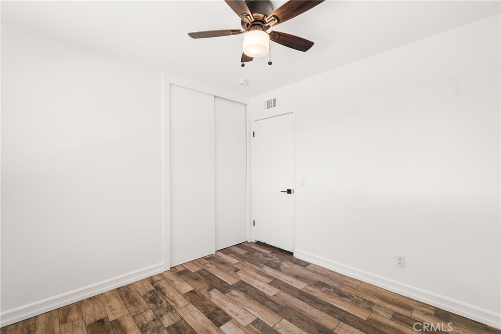 6661 Yucca Avenue Rialto, CA 92376 - Photo 24 of 44 a view of a room with a ceiling fan