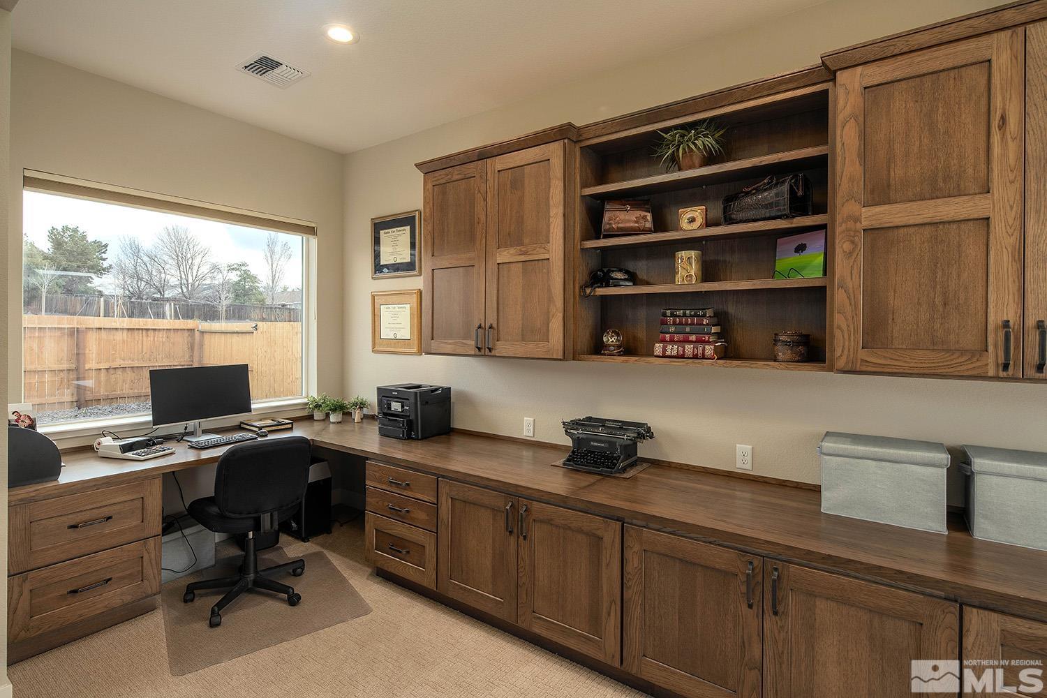 3020 Feathertop Drive Reno, NV 89521 - Photo 19 of 40 a view of a workspace with furniture and a window