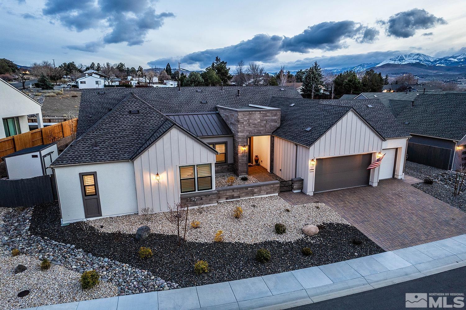 3020 Feathertop Drive Reno, NV 89521 - Photo 2 of 40 a view of house with a yard and ocean view