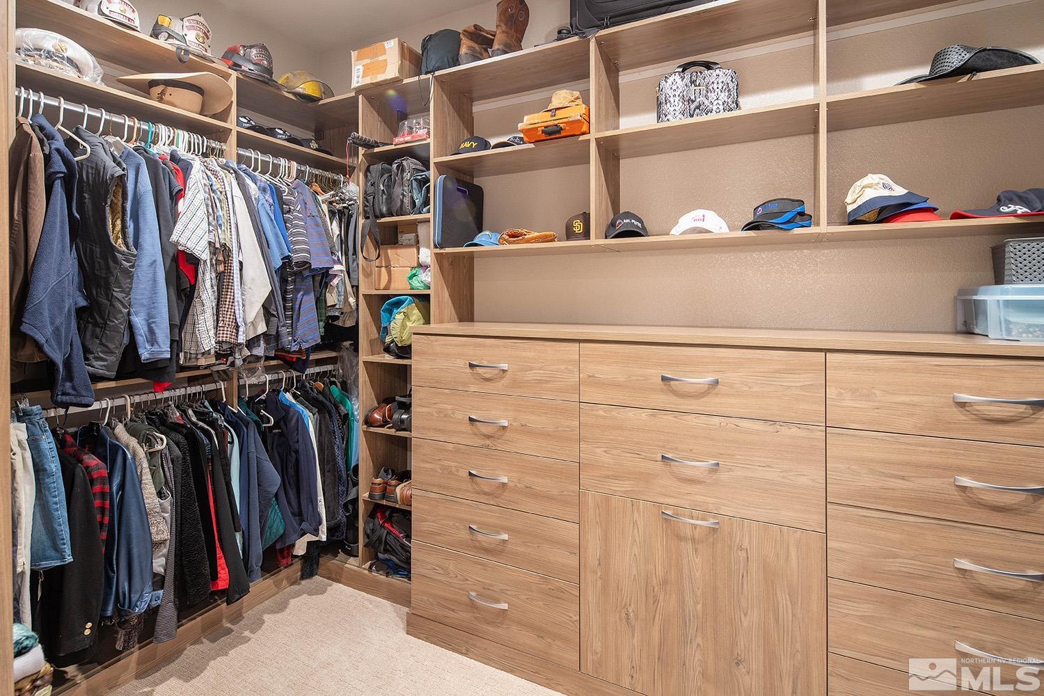 3020 Feathertop Drive Reno, NV 89521 - Photo 24 of 40 a view of walk in closet with clothes and shoes