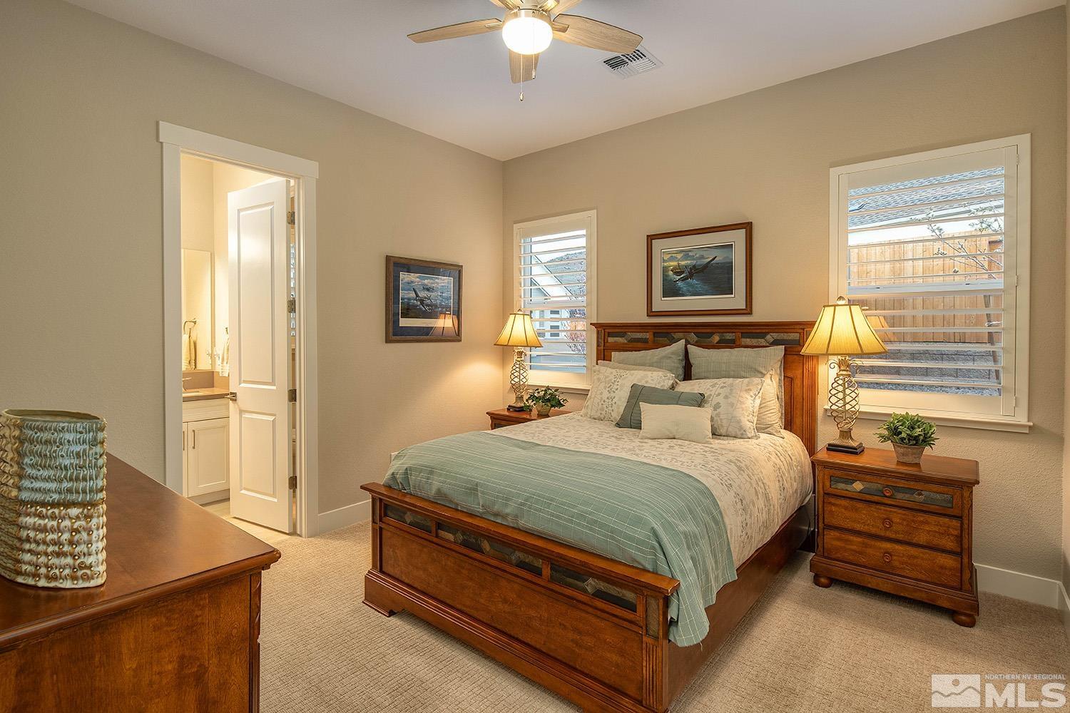 3020 Feathertop Drive Reno, NV 89521 - Photo 27 of 40 a bedroom with a bed and a window