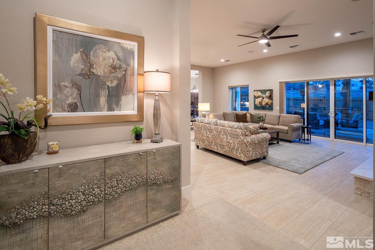 3020 Feathertop Drive Reno, NV 89521 - Photo 4 of 40 a living room with furniture and a large window