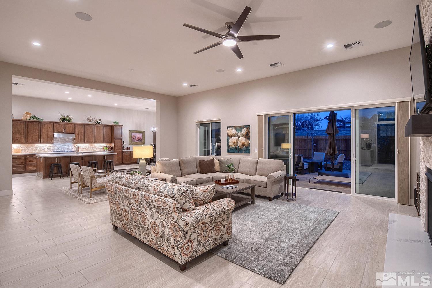 3020 Feathertop Drive Reno, NV 89521 - Photo 5 of 40 a living room with furniture kitchen view and a chandelier