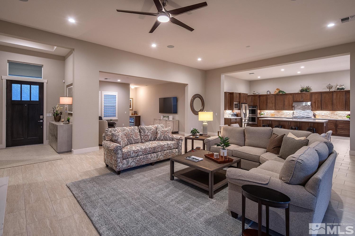 3020 Feathertop Drive Reno, NV 89521 - Photo 9 of 40 a living room with furniture and a large window