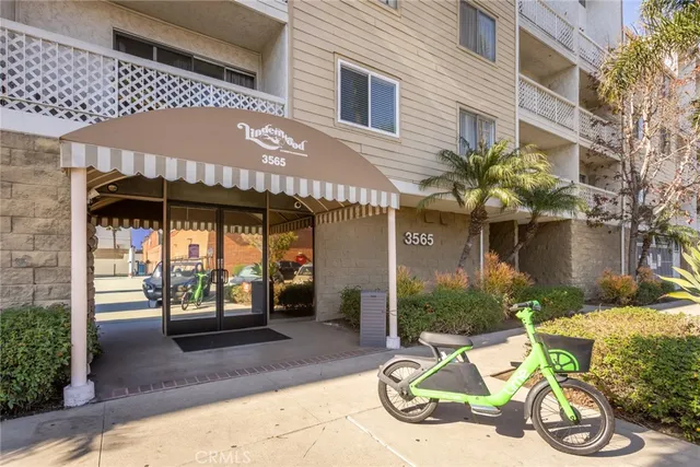 a front view of a building with street view