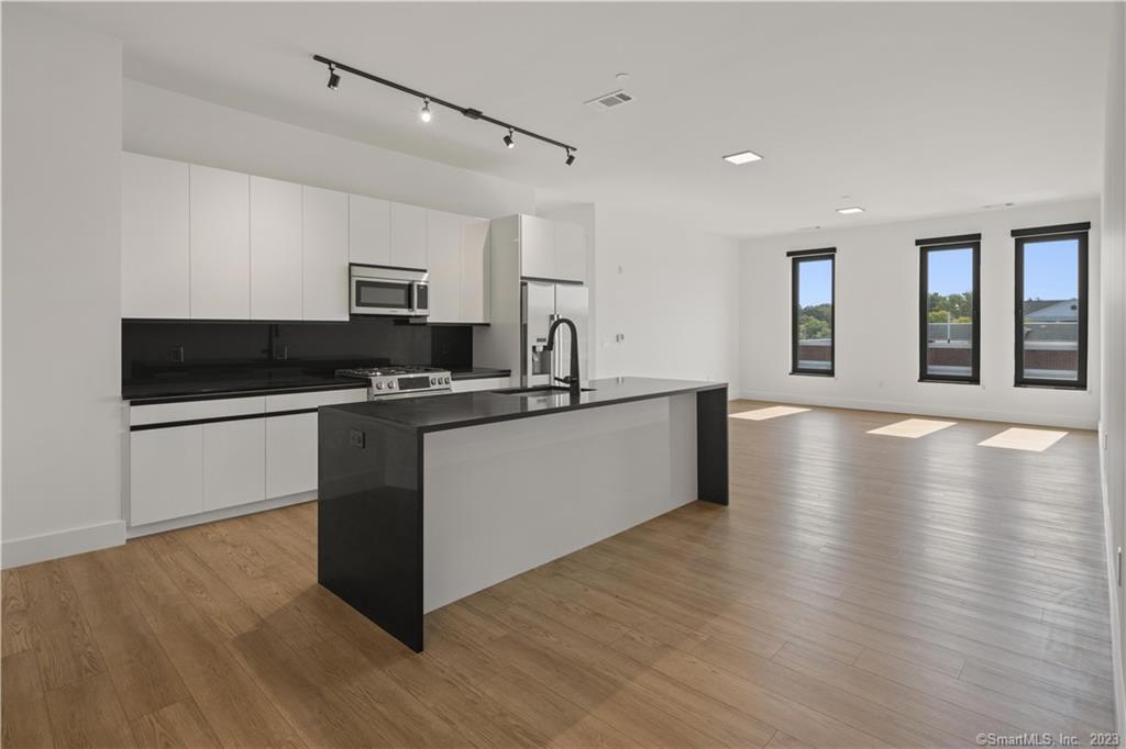 78 Unquowa Place, Unit 307 Fairfield, CT 06824 - Photo 1 of 1 Open floorplan kitchen/living/dining