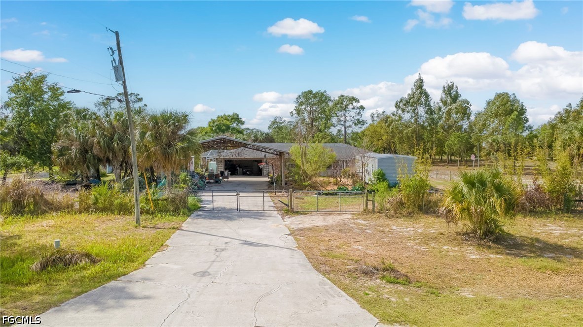4110 East 23rd Street Alva, FL 33920 - Photo 23 of 38 a house view with a sitting space and sitting space