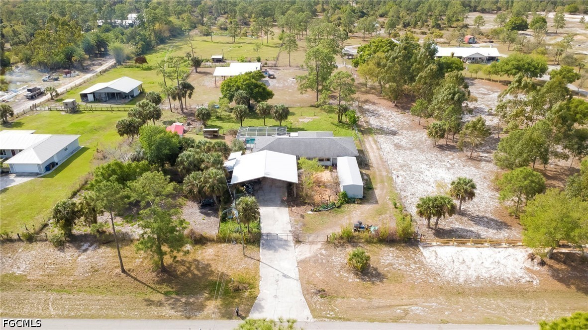 4110 East 23rd Street Alva, FL 33920 - Photo 27 of 38 an aerial view of residential houses with outdoor space