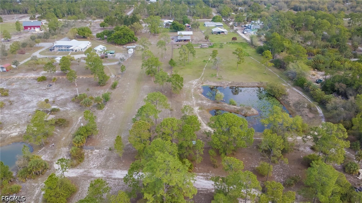 4110 East 23rd Street Alva, FL 33920 - Photo 31 of 38 an aerial view of residential houses with outdoor space