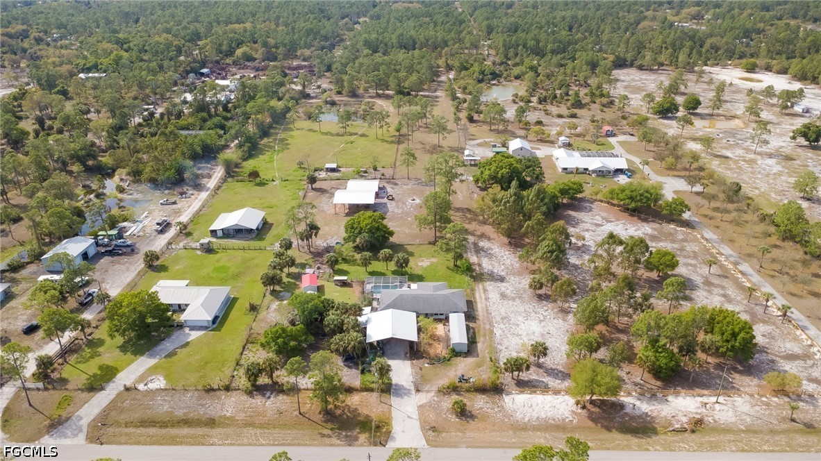4110 East 23rd Street Alva, FL 33920 - Photo 38 of 38 an aerial view of residential houses with outdoor space