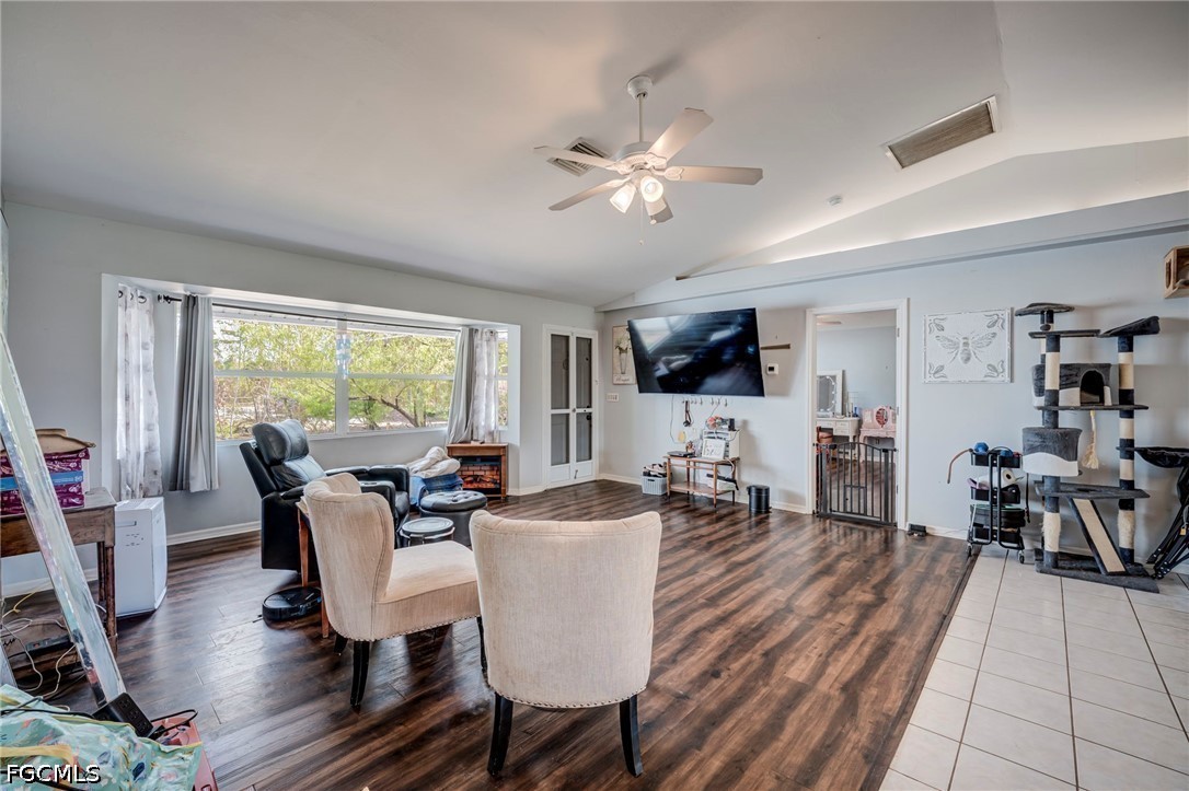 4110 East 23rd Street Alva, FL 33920 - Photo 6 of 38 a view of a dining room with furniture window and wooden floor