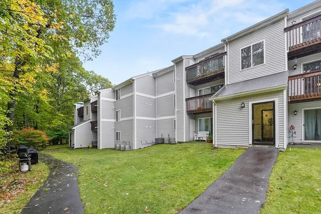 a view of a back yard of the house
