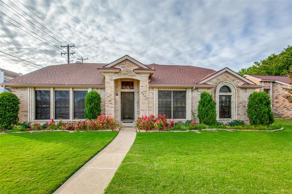 9442 Willard Street Rowlett, TX 75088 - Photo 1 of 1 a front view of a house with a yard and trees