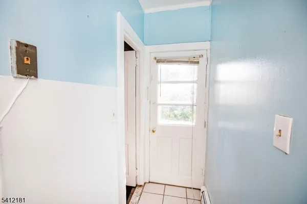 a view of a closet in a room
