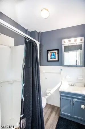 a bathroom with a bathtub and a sink