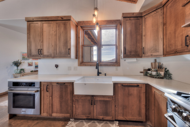 4173 Shadowfax Run, Unit 5 Moab, UT 84532 - Photo 20 of 41 Kitchen featuring light Quartz countertops, and Apron sink with pull down faucet