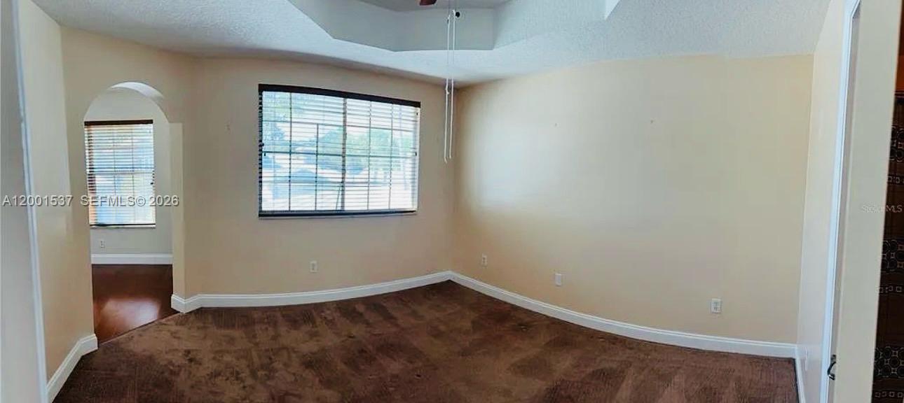 151 Coconut Key Lane Delray Beach, FL 33484 - Photo 15 of 21 a view of an empty room with a window