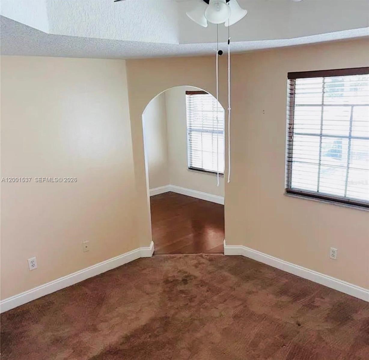 151 Coconut Key Lane Delray Beach, FL 33484 - Photo 17 of 21 an empty room with windows and closet