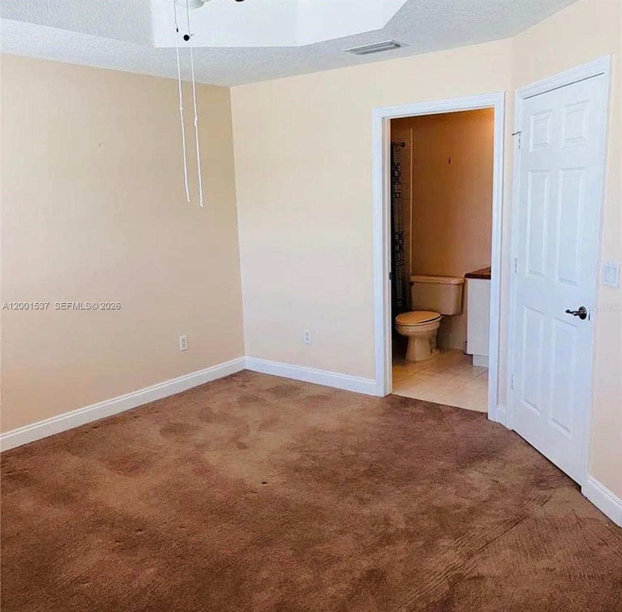 151 Coconut Key Lane Delray Beach, FL 33484 - Photo 19 of 21 a view of a room with a wardrobe space