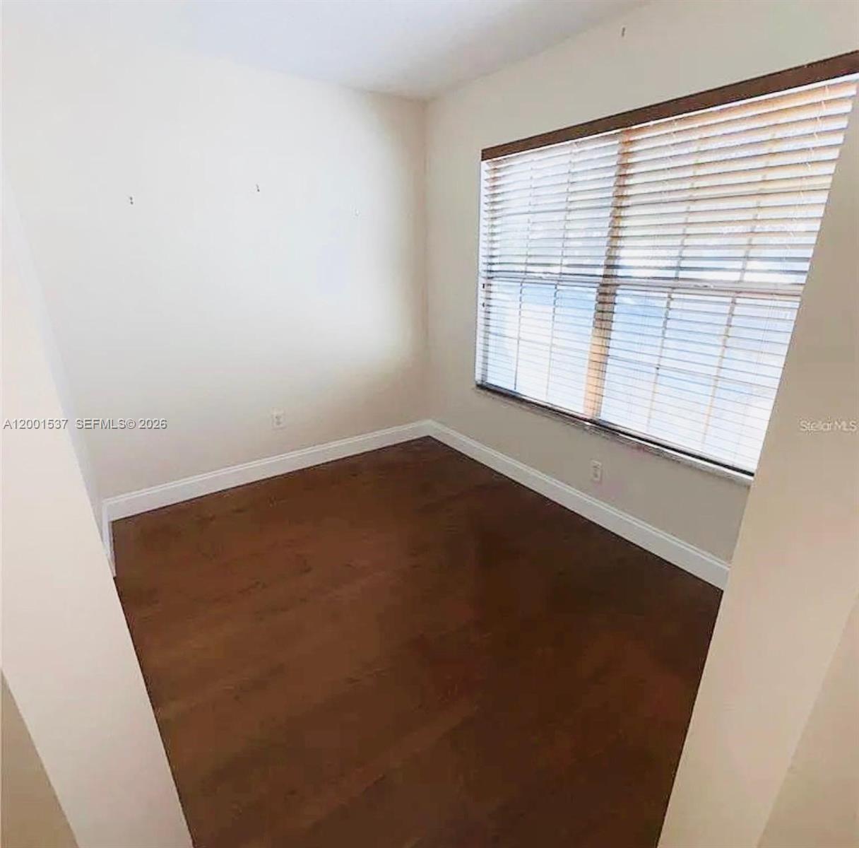 151 Coconut Key Lane Delray Beach, FL 33484 - Photo 20 of 21 an empty room with a window